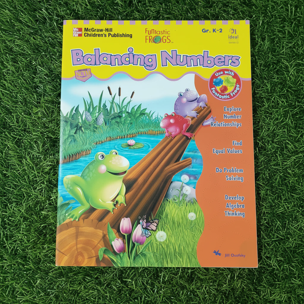 A children's educational workbook titled 'Balancing Numbers' by McGraw-Hill Children's Publishing and FulcrumFrogs, placed on green grass. The cover features colorful cartoon frogs, a pond, and an orange sidebar with learning objectives.