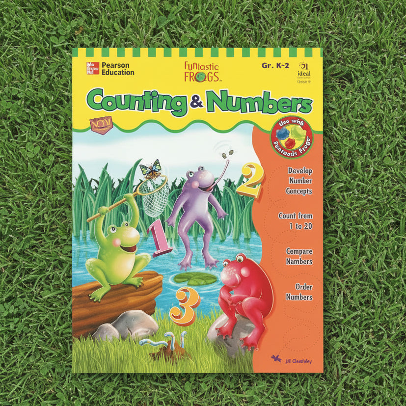 A children's counting and numbers workbook titled 'Counting & Numbers' by McGraw-Hill Children's Publishing, featuring colorful cartoon frogs in a pond with large number symbols 1, 2, and 3, placed on green grass.