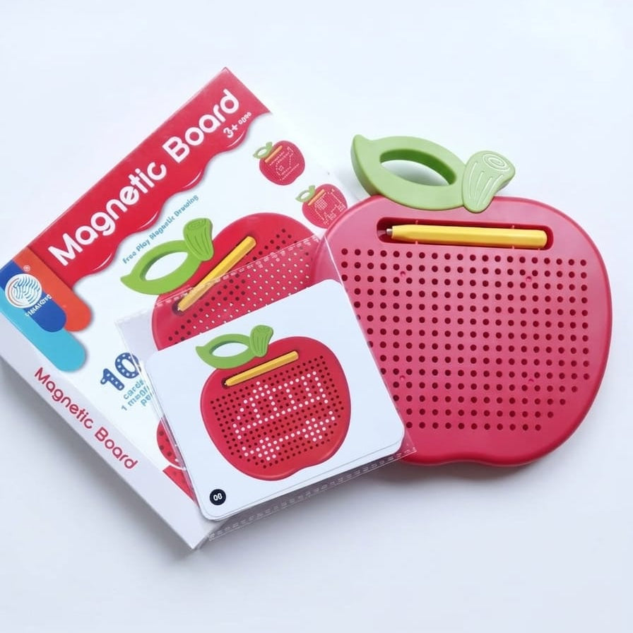 An apple-shaped magnetic writing board toy in red with green stem details, shown next to its retail packaging box on a clean white background.
