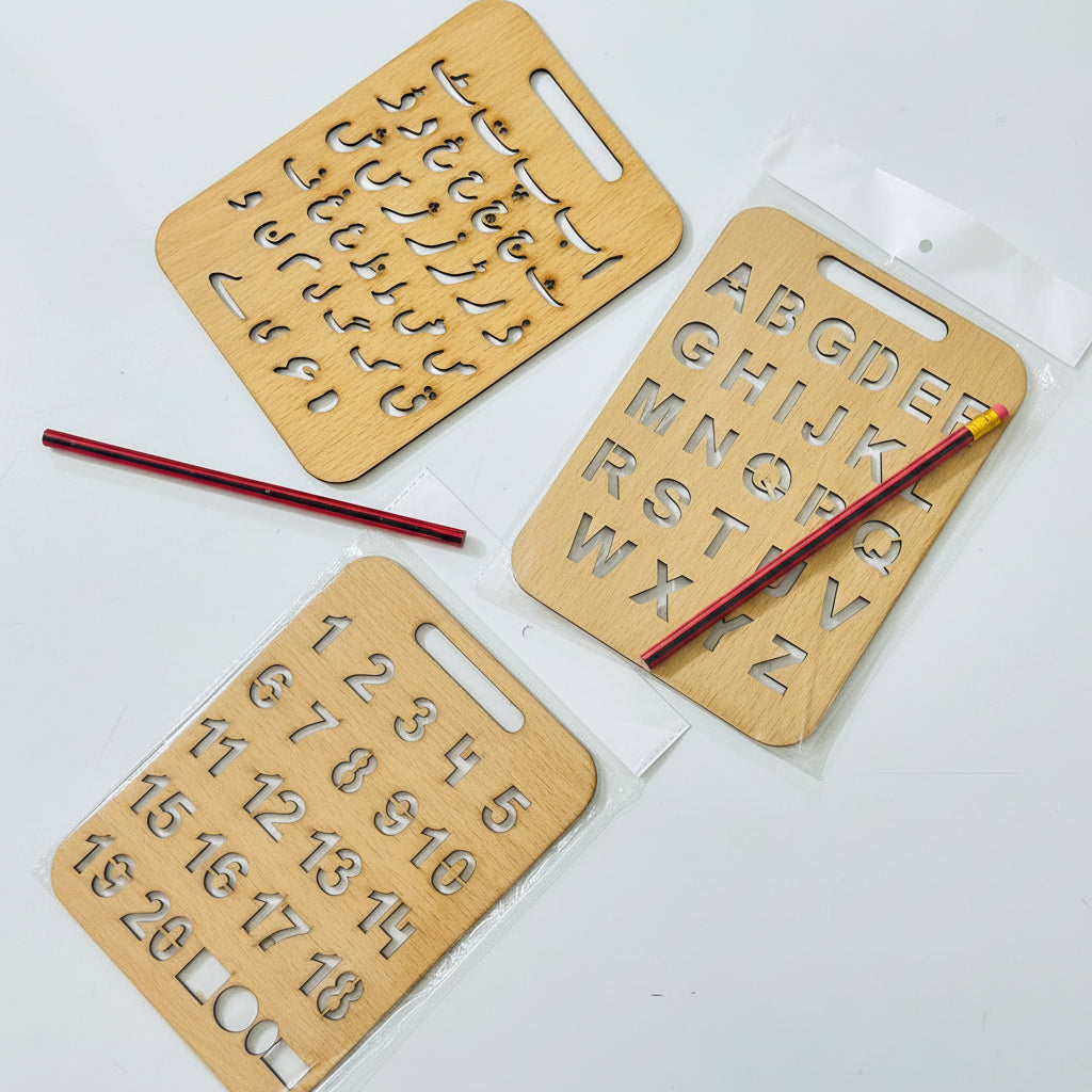 Three wooden stencils with letters, numbers, and geometric shapes on a white background.