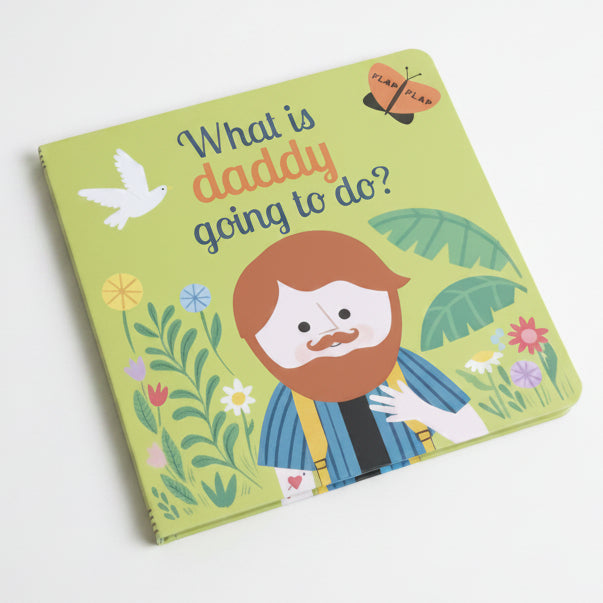 Children's book titled 'What is daddy going to do?' on grass