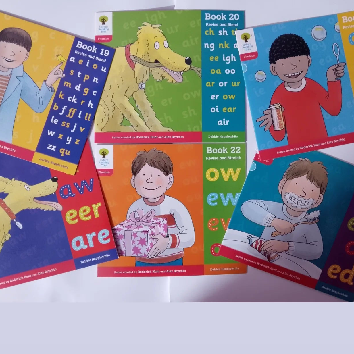 Set of colorful children's books on a white background